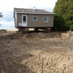 24x30ft cottage location on Lake Huron in Sauble Beach, rolled ahead to allow room for a new foundation to be poured.