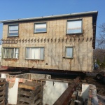 House 30x40ft was relocated 10 blocks away from downtown Kincardine along the river. Land used for a teaching school/office. Rolling house off the foundation.