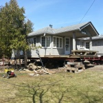 24x24ft and 35x24ft cottage being raised in Sauble Falls to create a walkout basement for more square footage and to be winterized.