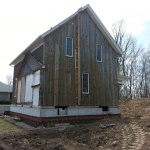 Farm house built in the 1860's made with Insulbrick 25x34ft was sold to neighbour and moved to a nearby farm. House sitting on new foundation