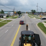 Shed moved across Port Elgin to South End customer. View from the roof of a shed being moved up Hwy 21.