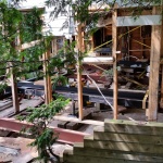 Due to the bank shifting, helical piles were drove 120 ft into the ground combined with steel beam in a grid system to support the cottage. If cottage was removed could not put it back in same location. Cottage was 78 steps to the top and 82 to the beach.