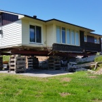 Single ranch bugalow (34x42ft) relocated from one end of Walkerton to the other side because of a housing complex development for seniors.