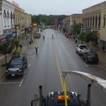 Single ranch bugalow (34x42ft) relocated from one end of Walkerton to the other side because of a housing complex development for seniors. House being navigated through downtown Walkerton.