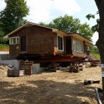 Single ranch bugalow (34x42ft) relocated from one end of Walkerton to the other side because of a housing complex development for seniors. House at new location.