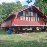 32x90 dinning hall at a kids camp in walkteron, raised to install crawlspace from piers