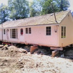 Cottage 18x40 ft was sitting on two lots. Developer wanted to split lots to sell. Cottage was purchased and moved to a new location.