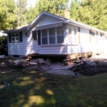 House 24x34ft was purchased to move to new location on the Saugeen First Nation Reserve. Sand bags were used as a foundation into of a poured concrete foundation.