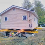 20x30 cottage raised and rolled off out foundation to make room to build a new foundation.