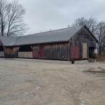Grey Roots Museum in Owen Sound, barn 20x82 ft was rolled out of the way for new foundation.